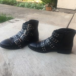 Black moto ankle boots with side zipper